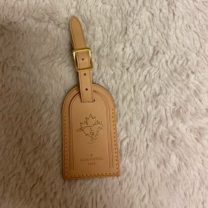 Authentic Louis Vuitton luggage tag